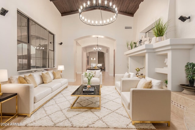 living room with wood-type flooring, a chandelier, high vaulted ceiling, and wooden ceiling