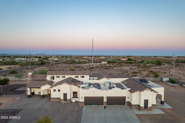 view of aerial view at dusk