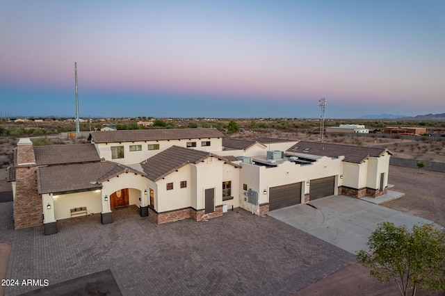 view of aerial view at dusk