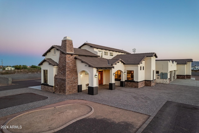 view of front of home with a patio area