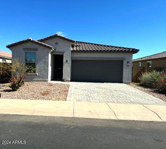 view of front of home with a garage