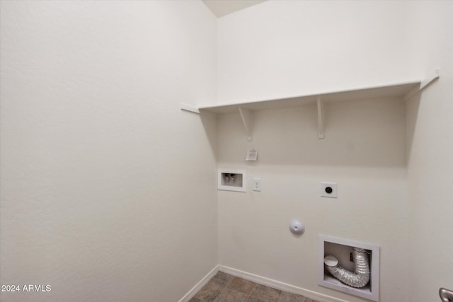 clothes washing area featuring hookup for a gas dryer, hookup for a washing machine, and electric dryer hookup