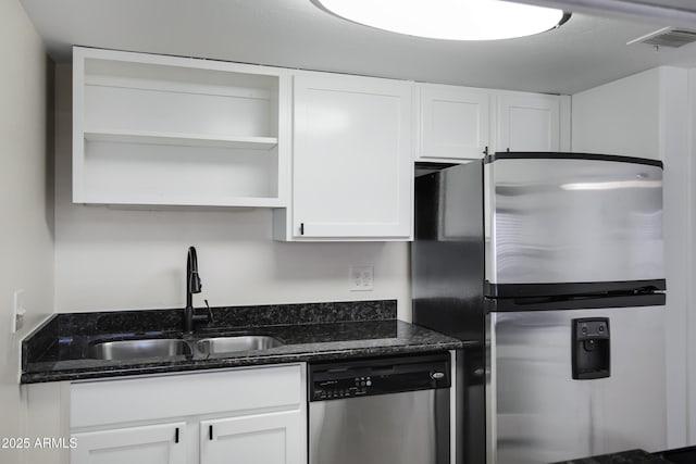 3619 E Monterosa St Unit 202, Phoenix, AZ 85018 - kitchen with stainless steel appliances, open shelves, white cabinets, and dark stone countertops