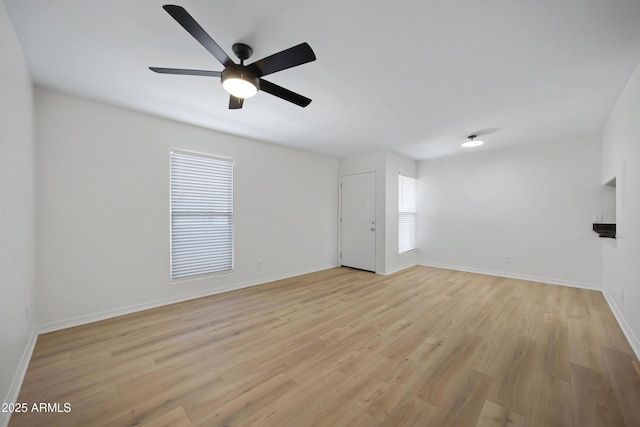 3619 E Monterosa St Unit 202, Phoenix, AZ 85018 - spare room with light wood finished floors and ceiling fan