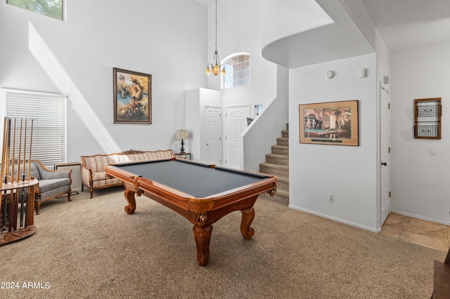 playroom with pool table, carpet flooring, and a towering ceiling