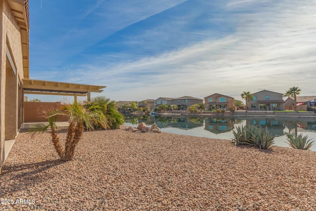 view of yard featuring a water view