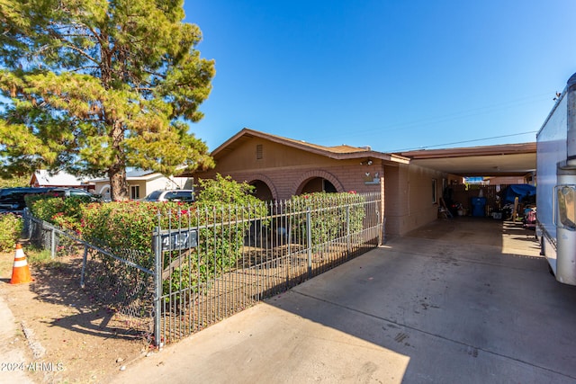 view of front of house with a carport