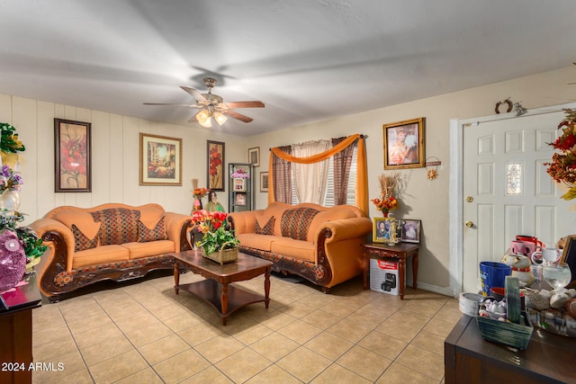 tiled living room featuring ceiling fan