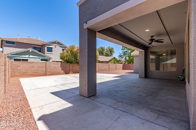 view of patio / terrace with a ceiling fan and a fenced backyard