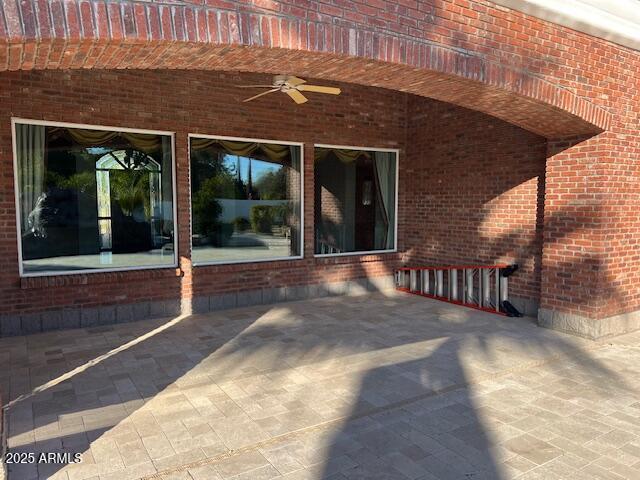 view of patio / terrace with a ceiling fan