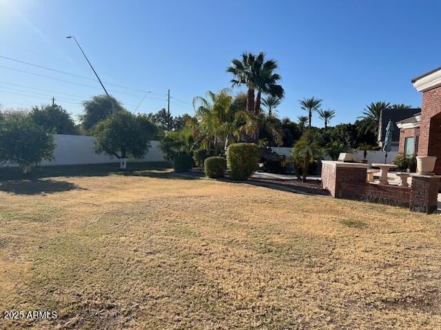 view of yard featuring fence