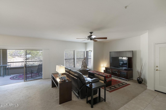 19700 N 76th St Unit 1058, Scottsdale, AZ 85255 - living area with light carpet, light tile patterned floors, and a ceiling fan