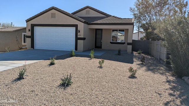 view of front of property featuring a garage