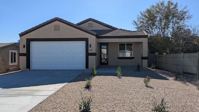 view of front of home featuring a garage