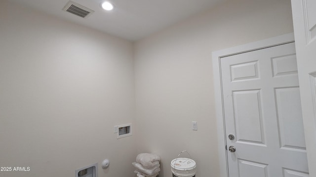 laundry area with hookup for a gas dryer and hookup for a washing machine