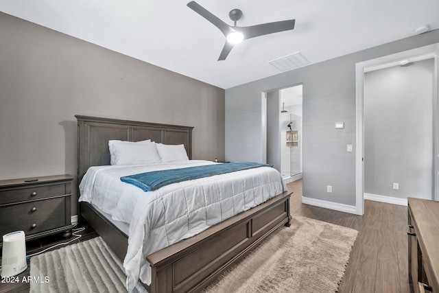 bedroom featuring ceiling fan and dark hardwood / wood-style floors