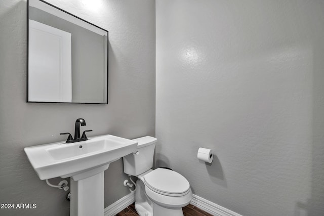 bathroom featuring toilet