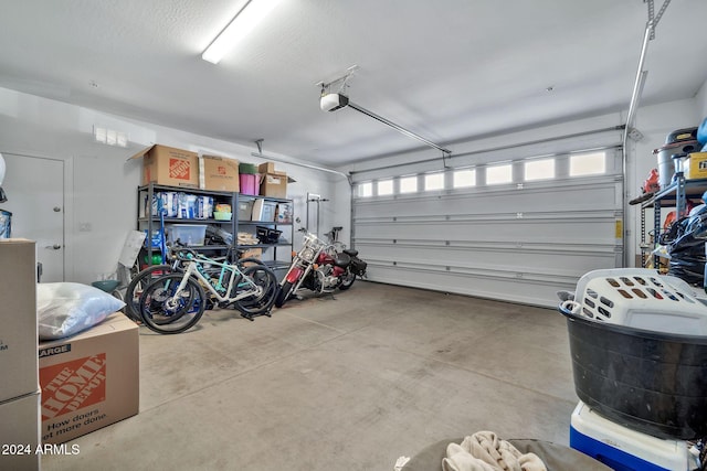 garage featuring a garage door opener