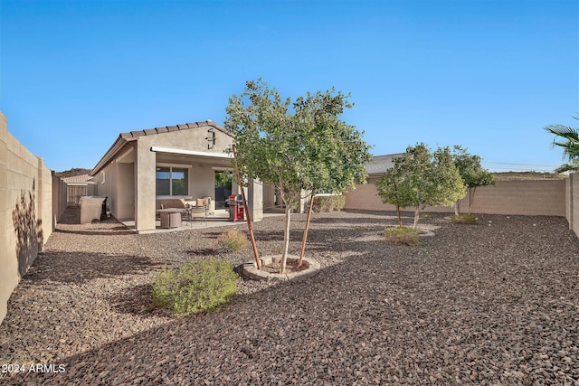 rear view of property with a patio area