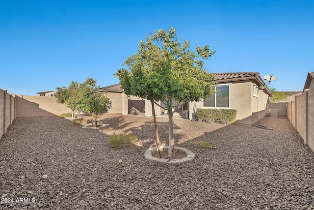 view of side of home with a garage