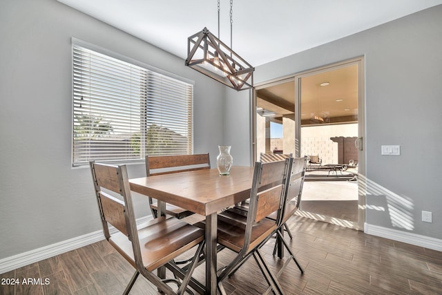 dining area featuring wood-type flooring