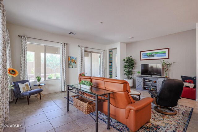 living room featuring light tile patterned floors