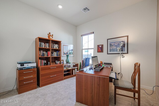 office area with light tile patterned floors