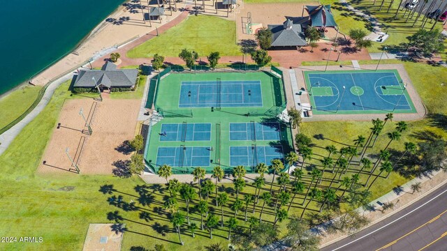 birds eye view of property with a water view