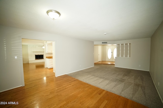 empty room featuring hardwood / wood-style flooring