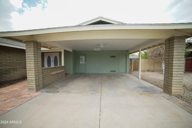 view of parking featuring a carport