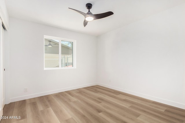 empty room featuring light hardwood / wood-style floors and ceiling fan