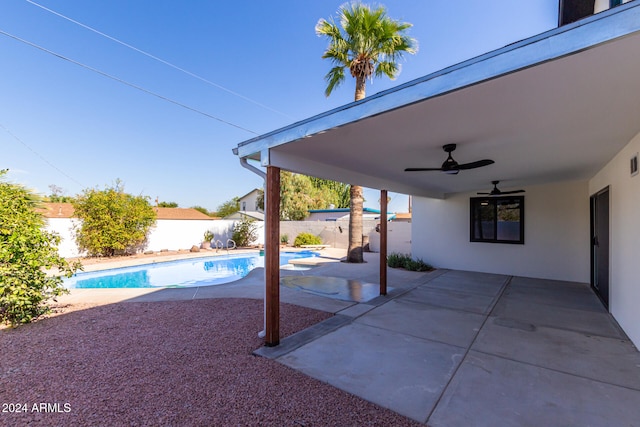 view of pool featuring a patio area and ceiling fan