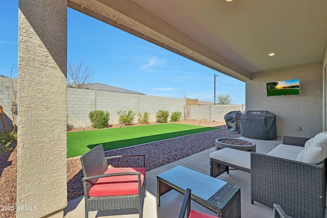 view of patio / terrace with outdoor lounge area, a fenced backyard, and grilling area