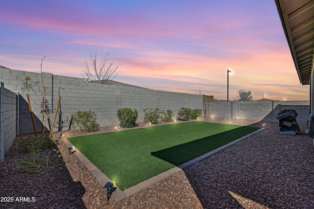 view of yard featuring a fenced backyard