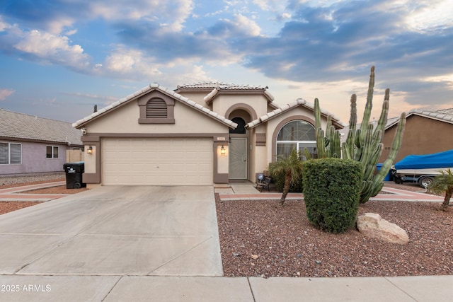 view of front of property with a garage