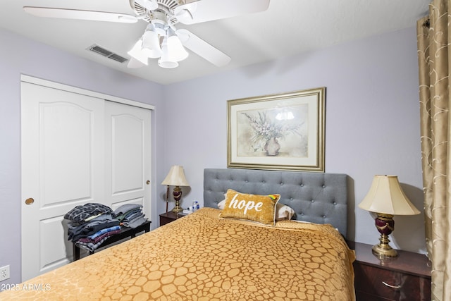 bedroom featuring ceiling fan and a closet