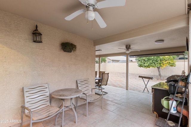 view of patio with ceiling fan