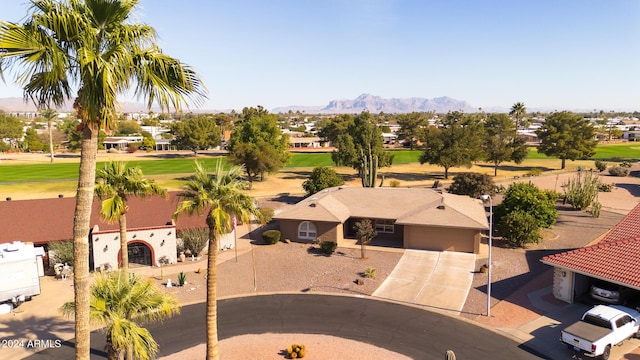 drone / aerial view featuring a mountain view