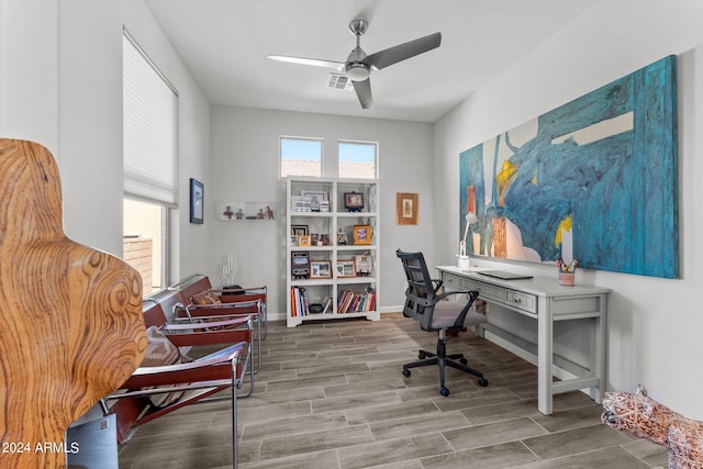 office area with ceiling fan and hardwood / wood-style flooring