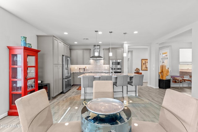 dining area with light hardwood / wood-style flooring