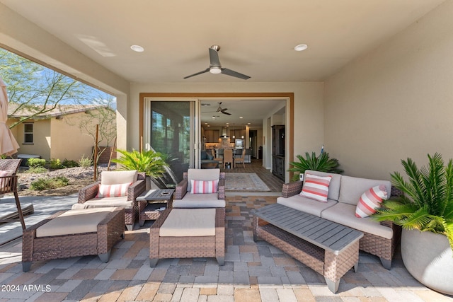 view of patio featuring ceiling fan and outdoor lounge area