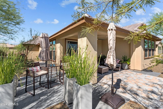 exterior space featuring an outdoor hangout area