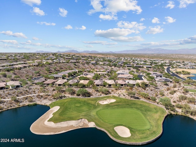 aerial view featuring a water and mountain view