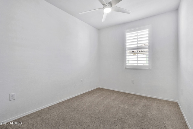 unfurnished room featuring ceiling fan and carpet flooring