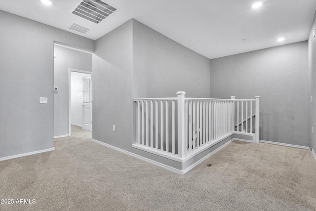 hallway featuring carpet flooring