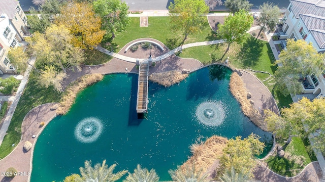 drone / aerial view with a water view