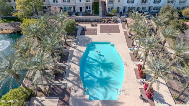 view of swimming pool with a patio