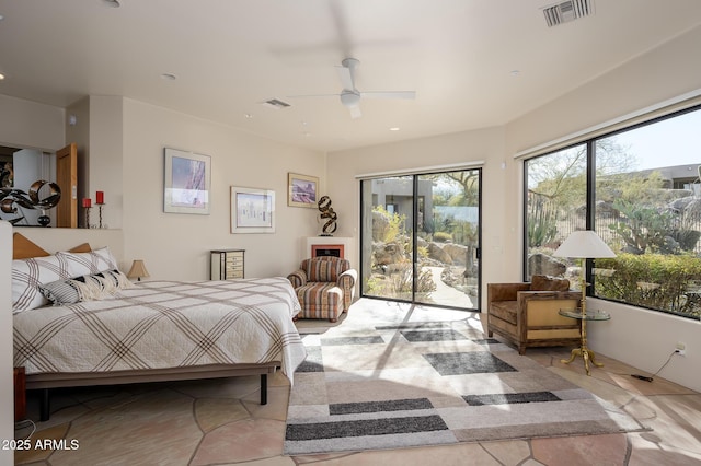 bedroom featuring access to exterior and ceiling fan