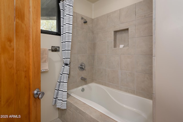 bathroom with shower / tub combo