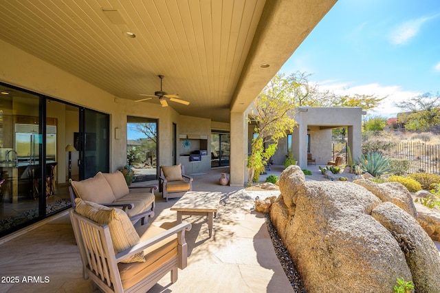 view of patio featuring outdoor lounge area and ceiling fan